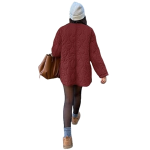 Women's oversized burgundy quilted jacket with diamond patterns and round collar