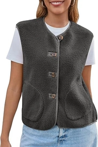 Detail of dark grey sherpa fleece vest with wooden buttons and large round pockets