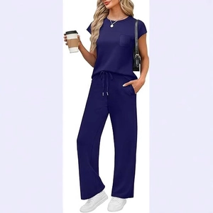 Women's casual navy blue lounge set featuring crewneck pocket tee and wide-leg drawstring pants