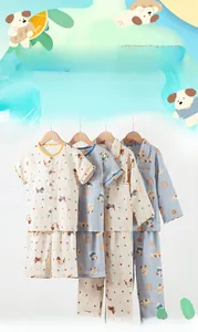 Detail of breathable double-layer cotton kids pajamas with cute cartoon dog patterns
