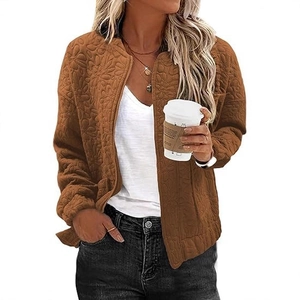 Women's brown quilted zip jacket with floral embossing and a classic stand collar