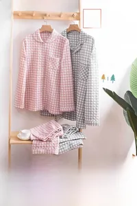 Detail view of quilted thermal cotton pajamas set featuring classic plaid texture and soft fabric