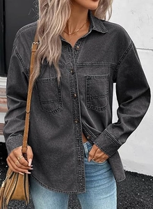 Detail of dark gray washed denim shirt featuring double chest pockets and metal buttons