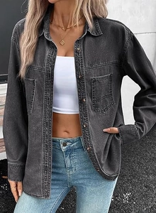 Detail of washed grey denim shirt with double utility pockets and button closure for women