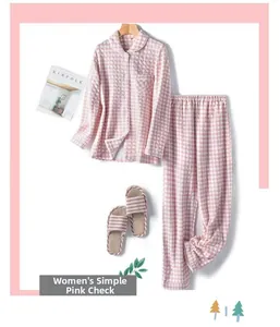 Detailed view of pink plaid cotton pajamas with button-down collar and chest pocket