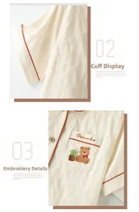 Detail of cream cotton pajama top with teddy bear embroidery and orange piping accents