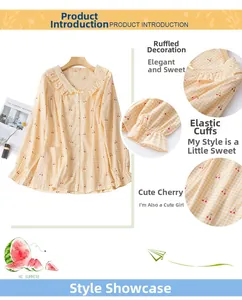 Detail of yellow checkered cotton pajama top with cherry print and ruffled collar