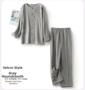 Detail of grey houndstooth flannel nursing wear with velcro closures and soft texture