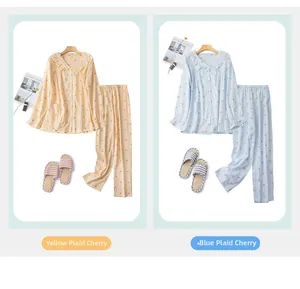 Detail of cotton pajamas set with cherry print, ruffled V-neck top and matching slippers