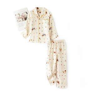 Cotton pajamas set featuring cartoon dachshund and polka dot print on cream fabric