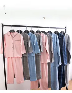 Detail of soft brushed cotton flannel pajamas showing the classic plaid texture and collar