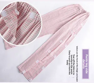 Detail of pink gingham patient pants with side velcro closures and elastic waist