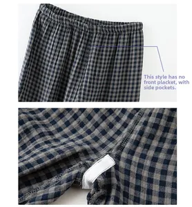 Détail du pantalon de pyjama à carreaux montrant la taille élastique sans braguette