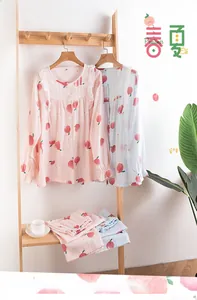 Detail view of 100% pure cotton double gauze peach print pajama set with soft texture