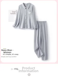 Close-up of diamond quilted pajama texture with delicate bird embroidery and ribbed cuffs