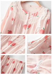 Detail of cotton pajama set with peach prints featuring lace edges and ruffle collar