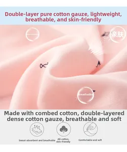 Macro detail of breathable double-layer pink cotton gauze fabric with small fish print