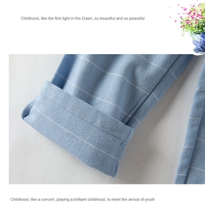 Detail of light blue striped flannel fabric showing soft brushed cotton texture and cuff