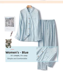 Detail of light blue cotton gauze pajamas showing breathable fabric and small fish print