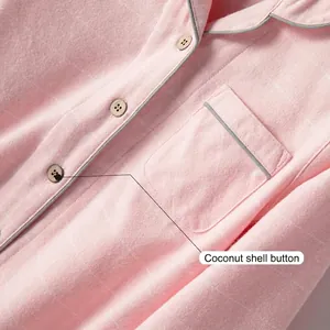 Pink plaid cotton pajama top with coconut shell buttons and grey piped edge detailing
