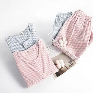 Unisex brushed cotton plaid pajama sets in light blue and pink for autumn warmth