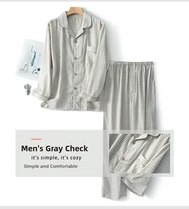 Detail of grey checkered cotton pajamas featuring chest pocket and soft textured fabric