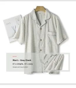 Macro view of grey plaid cotton fabric texture on men's short sleeve pajama set