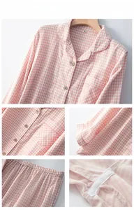 Detail view of pink gingham cotton pajamas showing wood buttons and stitching