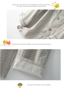 Close-up of wooden button detail and plaid cotton fabric texture on Japanese style pajamas