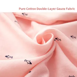 Pink double-layer cotton gauze pajamas with small fish print showing soft fabric texture