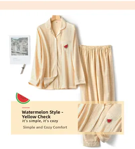 Detail of yellow gingham pajama set featuring a cute embroidered watermelon pocket design