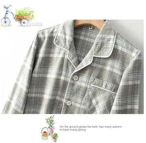 Close-up of kids checkered cotton pajamas with notched lapel and soft brushed texture