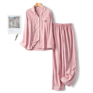 Women's pink plaid cotton pajama set with cute strawberry embroidery and button-up top