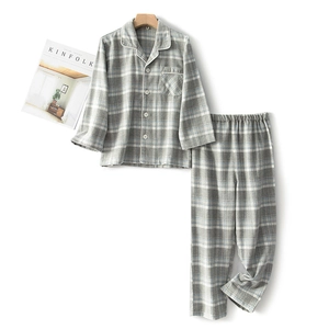 Kids plaid cotton pajama set with button-down long sleeves and matching pants
