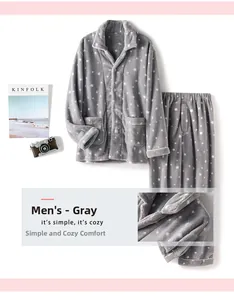 Detail of men's gray coral fleece pajamas featuring a white star pattern and button-up front