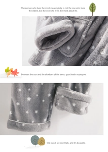 Close-up detail of gray star print coral fleece pajama set with thick warm fabric