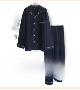 Navy blue men's pajama set featuring white piping trim and soft cotton texture