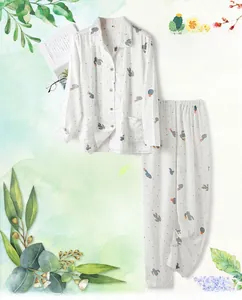 Detail of cotton pajama set with cactus print featuring wooden buttons and pocket