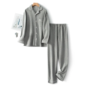 Light grey quilted pajama set for couples featuring long sleeves and diamond texture fabric