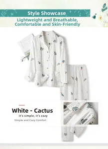Flat lay of women cotton pajama set with green cactus prints on soft white fabric