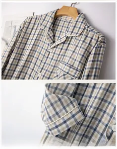 Detail of blue plaid cotton pajama set showing notch lapel and white piping finish