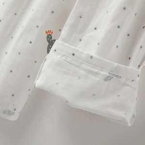 Women's cotton pajamas featuring cactus and star prints on long-sleeved cuff detail
