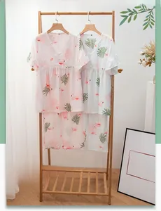 Detail of ruffle sleeves and flamingo leaf print on breathable cotton pajama set