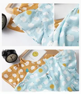 Close-up of girl cotton hedgehog nightgown with wood button and breathable fabric texture