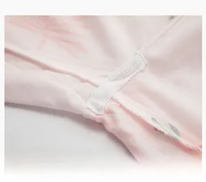 Detail view of reinforced crotch stitching on cute flamingo cotton pajama set