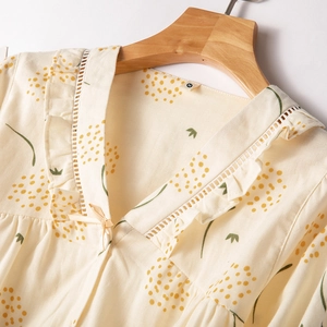Floral cotton pajama top with ruffled V-neck and delicate lace details in cream white