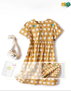 Detail of girls cotton nightdress with cute hedgehog print and ruffled sleeve edges