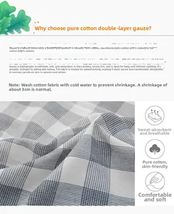 Detail of 100% cotton double-layer gauze fabric with blue and white plaid texture