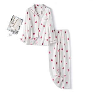 Women's pure cotton pajama set featuring a cute red strawberry print and long sleeves