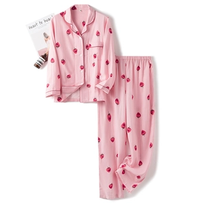 Pink cotton pajama set with cute strawberry print including long sleeve top and pants